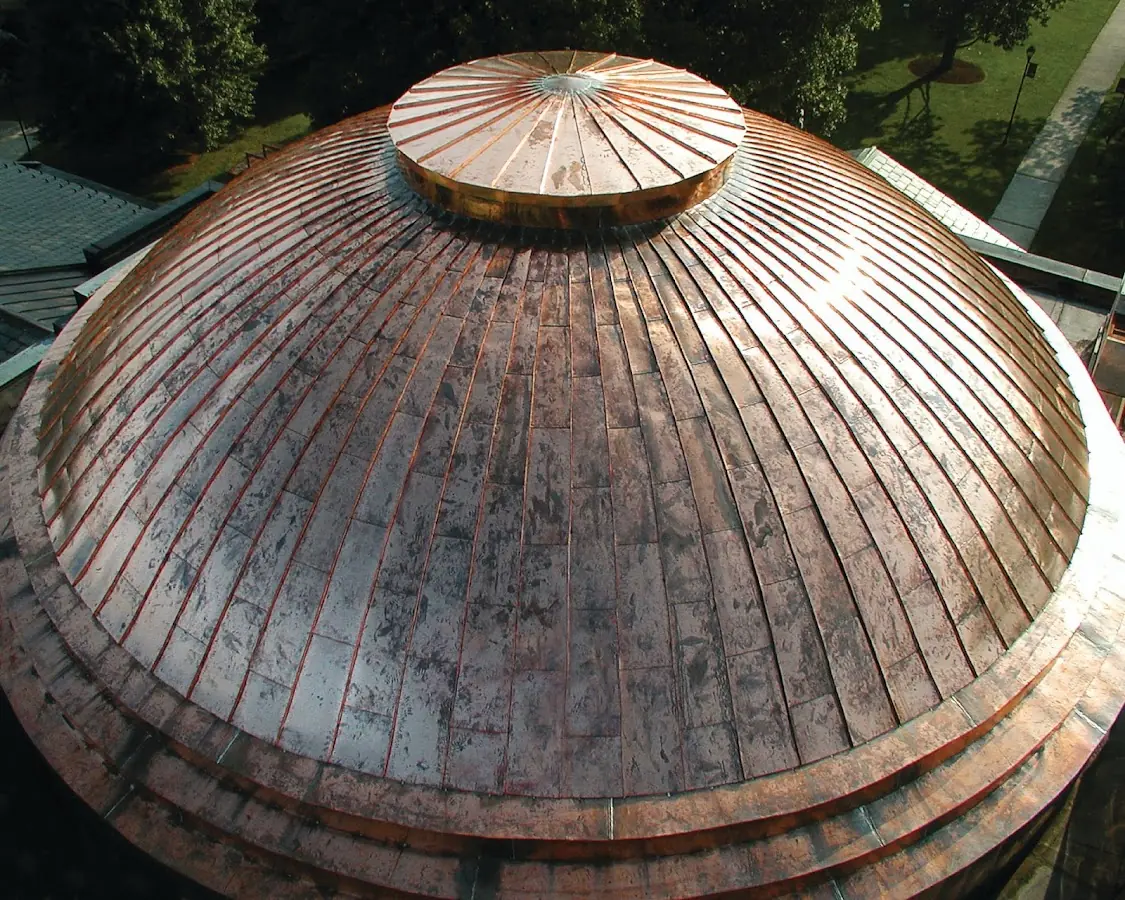 Craftsman Roofing crew installing a new roof in Raleigh West